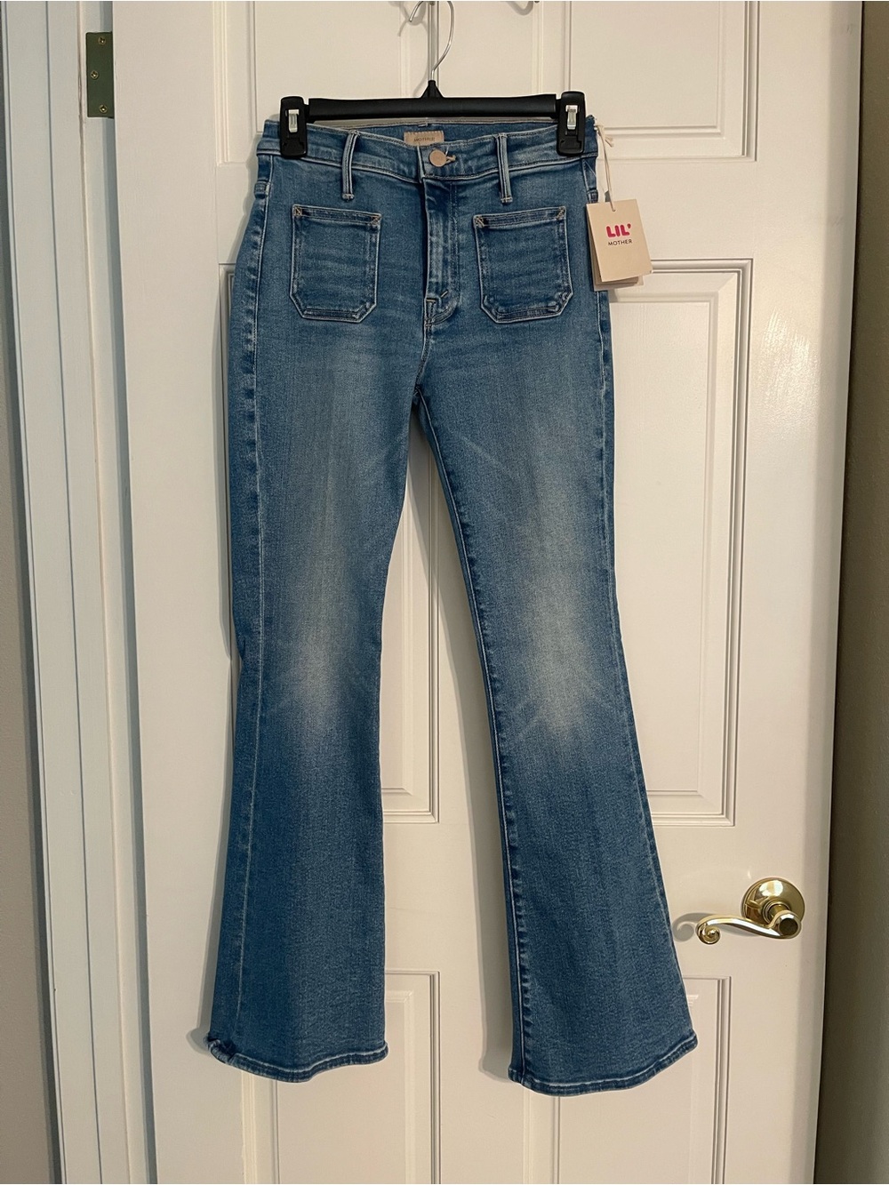 MOTHER Medium Light Blue Flare Jeans